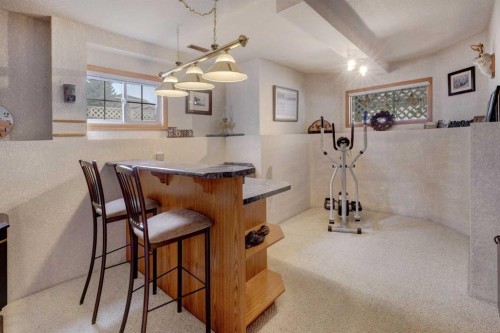 19 Everglade Drive Se, Airdrie, AB - Indoor Photo Showing Other Room