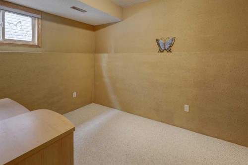 19 Everglade Drive Se, Airdrie, AB - Indoor Photo Showing Other Room