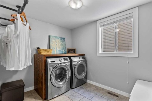 9759 Sanderling Way Nw, Calgary, AB - Indoor Photo Showing Laundry Room