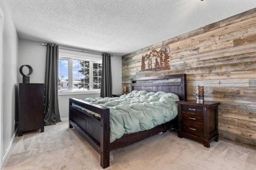 9759 Sanderling Way Nw, Calgary, AB - Indoor Photo Showing Bedroom