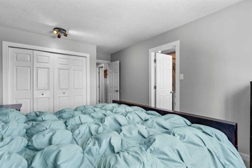 9759 Sanderling Way Nw, Calgary, AB - Indoor Photo Showing Bedroom