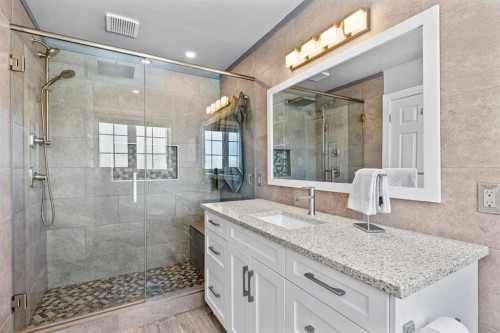 9759 Sanderling Way Nw, Calgary, AB - Indoor Photo Showing Bathroom