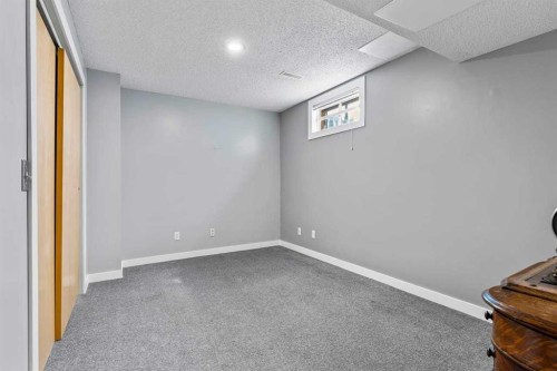 9759 Sanderling Way Nw, Calgary, AB - Indoor Photo Showing Other Room