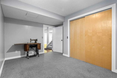 9759 Sanderling Way Nw, Calgary, AB - Indoor Photo Showing Other Room