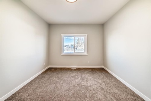 1102 Clover Close, Carstairs, AB - Indoor Photo Showing Other Room
