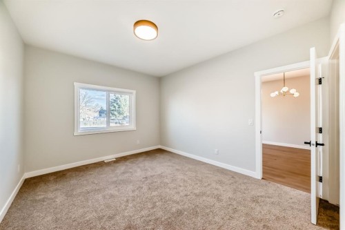 1102 Clover Close, Carstairs, AB - Indoor Photo Showing Other Room