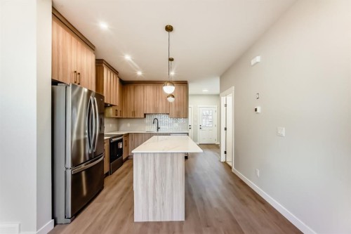 1102 Clover Close, Carstairs, AB - Indoor Photo Showing Kitchen