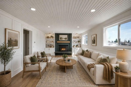 248 Madeira Place Ne, Calgary, AB - Indoor Photo Showing Living Room With Fireplace