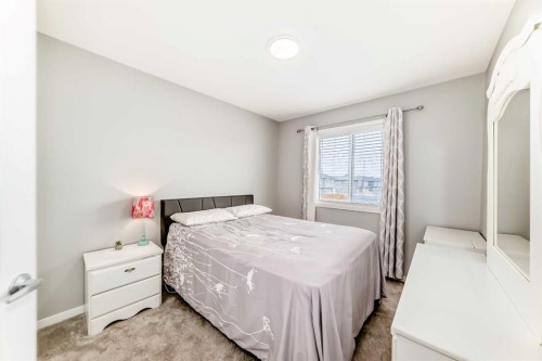 220 Cornerstone Grove Ne, Calgary, AB - Indoor Photo Showing Bedroom