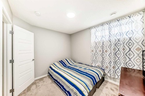 220 Cornerstone Grove Ne, Calgary, AB - Indoor Photo Showing Bedroom