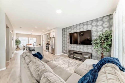 220 Cornerstone Grove Ne, Calgary, AB - Indoor Photo Showing Living Room With Fireplace