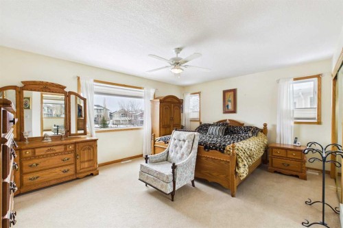 535 Cimarron Point, Okotoks, AB - Indoor Photo Showing Bedroom
