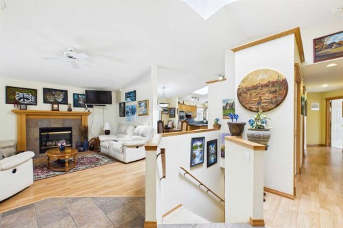 535 Cimarron Point, Okotoks, AB - Indoor With Fireplace