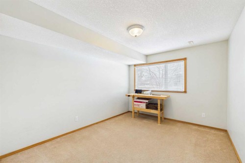 535 Cimarron Point, Okotoks, AB - Indoor Photo Showing Other Room