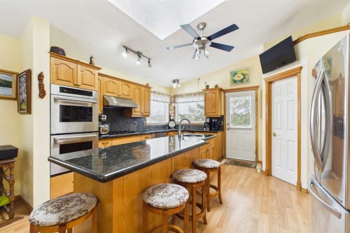 535 Cimarron Point, Okotoks, AB - Indoor Photo Showing Kitchen