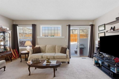 20 Covemeadow Manor Ne, Calgary, AB - Indoor Photo Showing Living Room