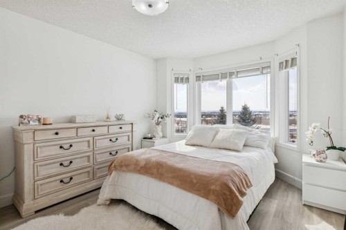 129 Mt Douglas Circle Se, Calgary, AB - Indoor Photo Showing Bedroom