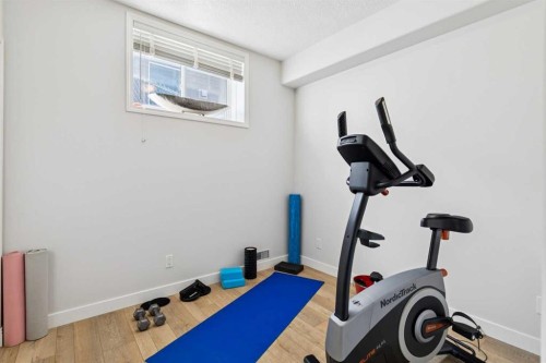 129 Mt Douglas Circle Se, Calgary, AB - Indoor Photo Showing Gym Room