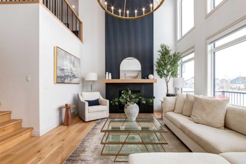 34 Rowmont Grove Nw, Calgary, AB - Indoor Photo Showing Living Room