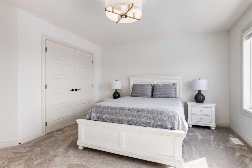34 Rowmont Grove Nw, Calgary, AB - Indoor Photo Showing Bedroom