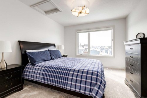 34 Rowmont Grove Nw, Calgary, AB - Indoor Photo Showing Bedroom