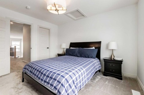34 Rowmont Grove Nw, Calgary, AB - Indoor Photo Showing Bedroom