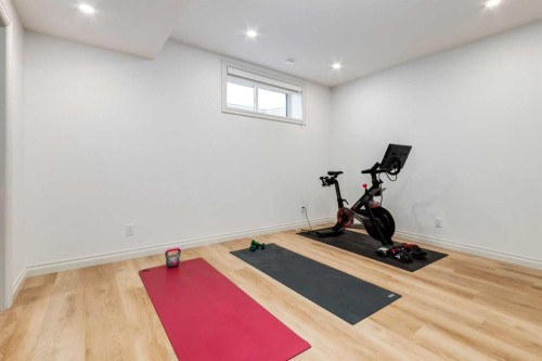 34 Rowmont Grove Nw, Calgary, AB - Indoor Photo Showing Gym Room