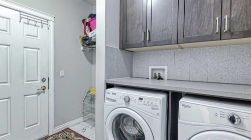 47 Saddlelake Way Ne, Calgary, AB - Indoor Photo Showing Laundry Room