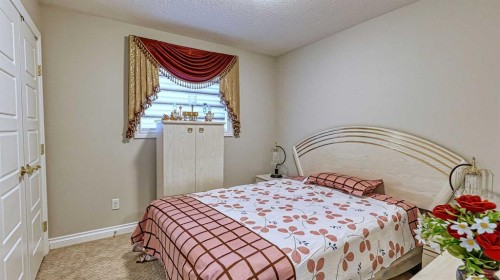 47 Saddlelake Way Ne, Calgary, AB - Indoor Photo Showing Bedroom