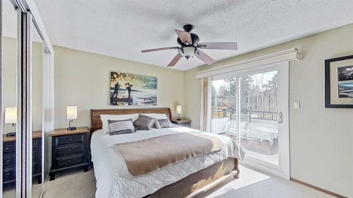 5801/5803 Dalgleish Road Nw, Calgary, AB - Indoor Photo Showing Bedroom