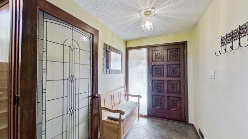 5801/5803 Dalgleish Road Nw, Calgary, AB - Indoor Photo Showing Other Room