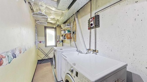 5801/5803 Dalgleish Road Nw, Calgary, AB - Indoor Photo Showing Laundry Room