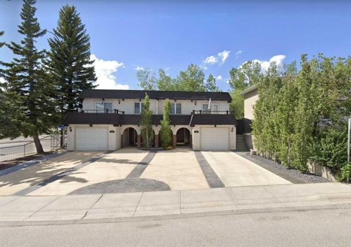 5801/5803 Dalgleish Road Nw, Calgary, AB - Outdoor With Facade