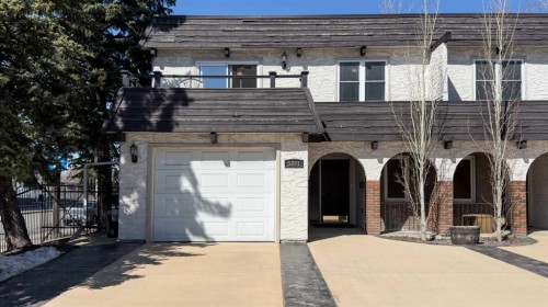 5801/5803 Dalgleish Road Nw, Calgary, AB - Outdoor With Facade