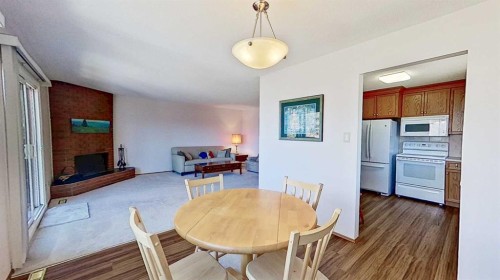 5801/5803 Dalgleish Road Nw, Calgary, AB - Indoor Photo Showing Dining Room