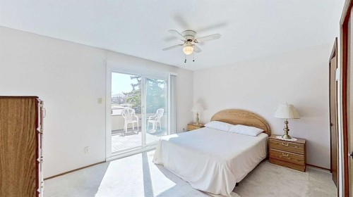 5801/5803 Dalgleish Road Nw, Calgary, AB - Indoor Photo Showing Bedroom