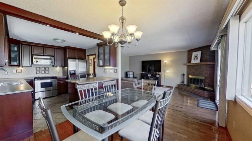 5801/5803 Dalgleish Road Nw, Calgary, AB - Indoor With Fireplace