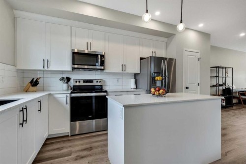 46 Creekstone Path Sw, Calgary, AB - Indoor Photo Showing Kitchen With Stainless Steel Kitchen With Upgraded Kitchen