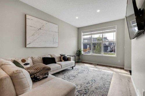 46 Creekstone Path Sw, Calgary, AB - Indoor Photo Showing Living Room