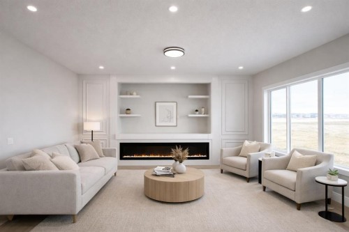 852 Dawson Point, Chestermere, AB - Indoor Photo Showing Living Room With Fireplace