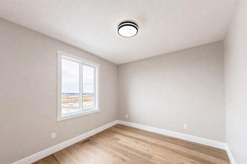 852 Dawson Point, Chestermere, AB - Indoor Photo Showing Other Room