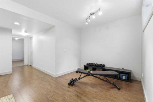 54 Wentworth Common Sw, Calgary, AB - Indoor Photo Showing Gym Room