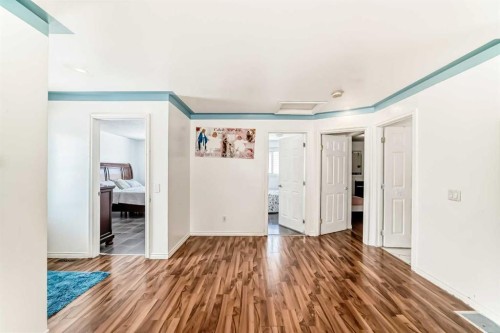 3803 49 Street Ne, Calgary, AB - Indoor Photo Showing Other Room With Fireplace