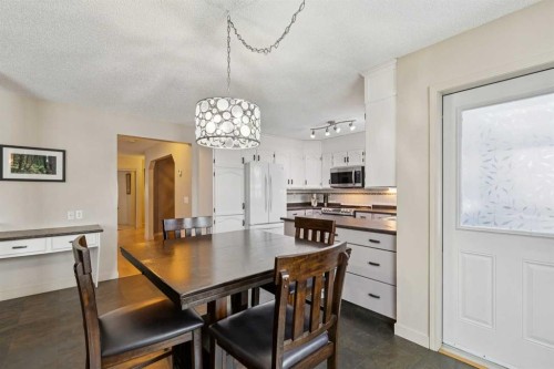 168 Erin Meadow Close Se, Calgary, AB - Indoor Photo Showing Dining Room