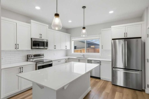 311 Wolf Creek Way Se, Calgary, AB - Indoor Photo Showing Kitchen With Stainless Steel Kitchen With Upgraded Kitchen