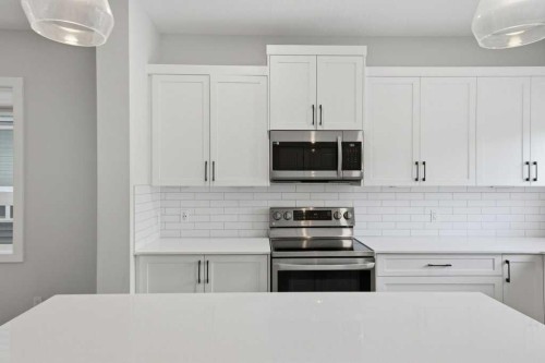 311 Wolf Creek Way Se, Calgary, AB - Indoor Photo Showing Kitchen