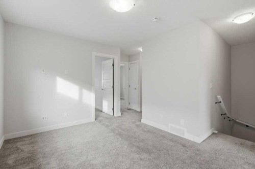 311 Wolf Creek Way Se, Calgary, AB - Indoor Photo Showing Other Room