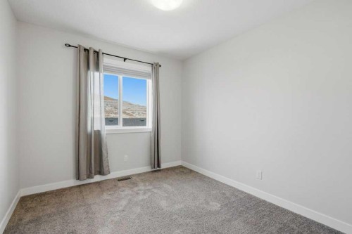 311 Wolf Creek Way Se, Calgary, AB - Indoor Photo Showing Other Room