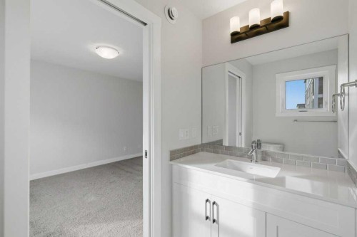 311 Wolf Creek Way Se, Calgary, AB - Indoor Photo Showing Bathroom