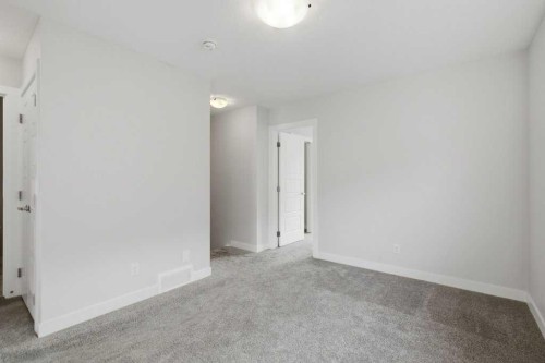 311 Wolf Creek Way Se, Calgary, AB - Indoor Photo Showing Other Room